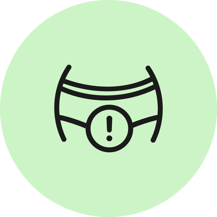 Symbol eines Autoreifen-Druckwarnsignals auf grünem Hintergrund, Reifen mit Ausrufezeichen markiert.