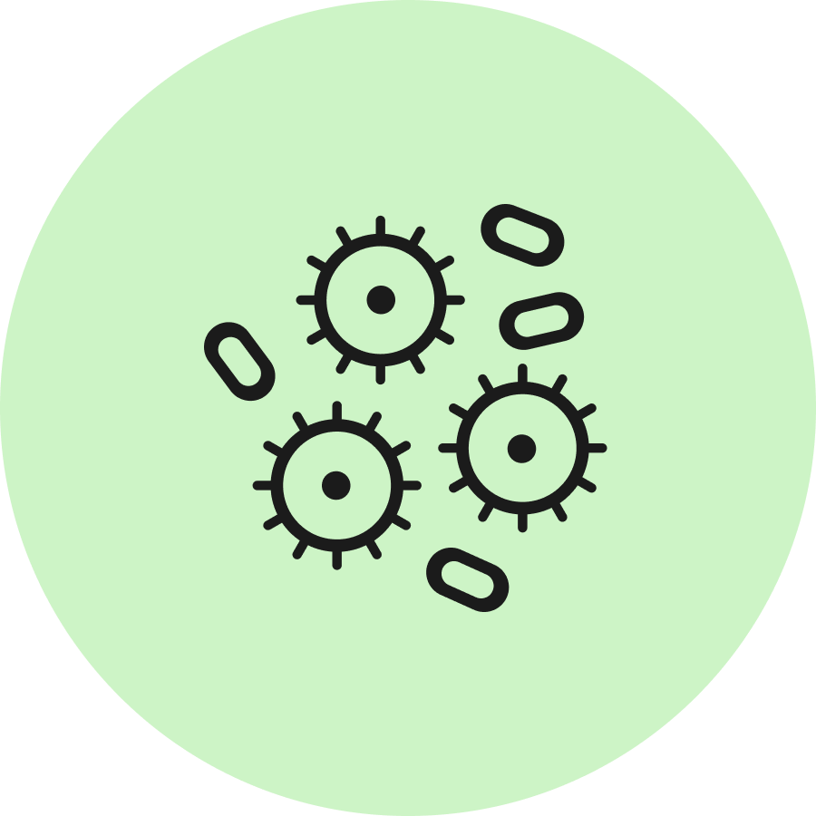Illustration von Bakterien und Tabletten auf einem grünen Hintergrund.
